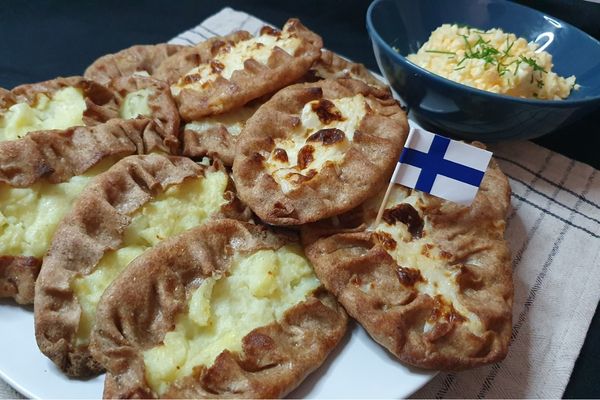 Karelian pies filled with potato mash and rice porridge together with egg butter